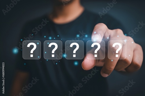 Wallpaper Mural A person pointing at five question mark icons with a dark background and blue light effects around them Torontodigital.ca