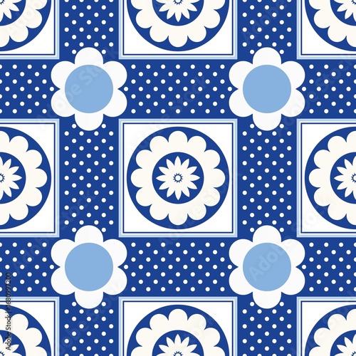 Blue white seamless background with flowers.
Abstract, repeating regular pattern for print.
Graphic design with regular shapes.