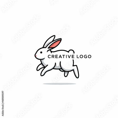 Gentle rabbit with long ears and soft fur sitting peacefully in a sunny garden environment.