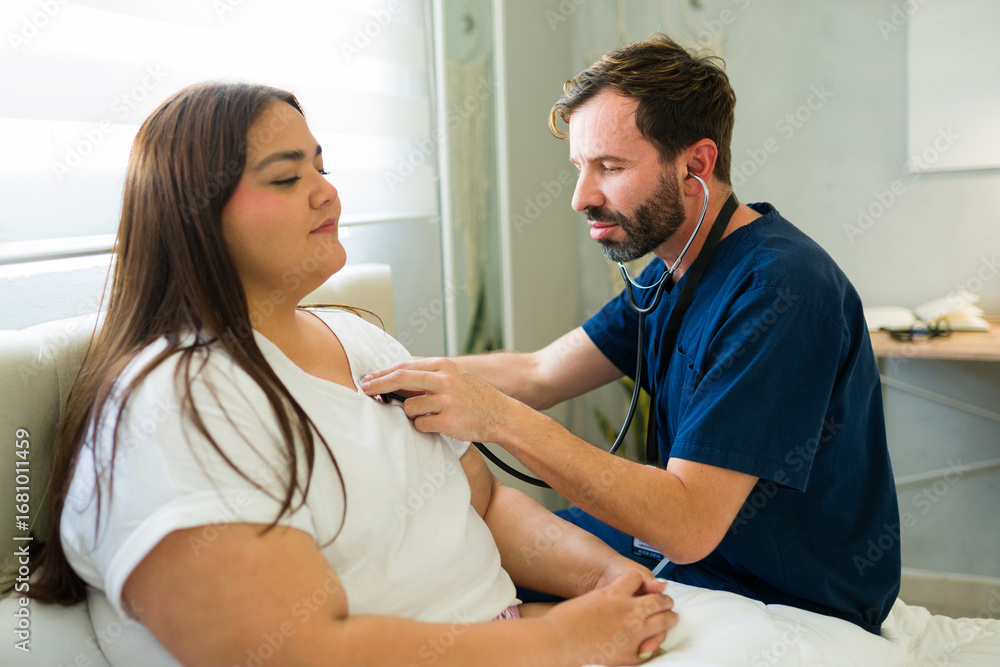 Fototapeta premium Medical professional visiting patient at home after surgery for post-operative care