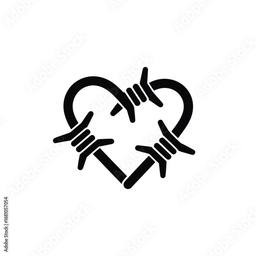 Barbed wire forms a heart shape symbolizing broken love and emotional pain