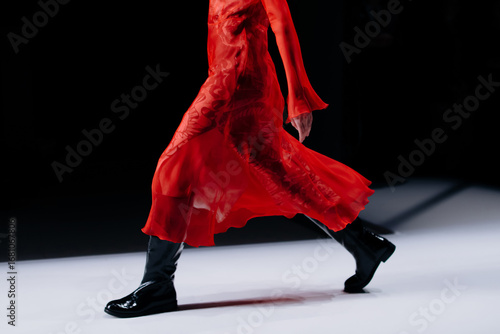 Fancy outfit of red silk long dress and black leather boots, women's fashion cloth, fashion model walking the runway fashion show