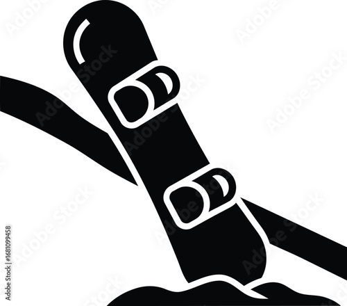 Black Snowboard with Bindings on Snow.