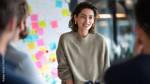 Confident Businesswoman Leading Team Meeting in Modern Office