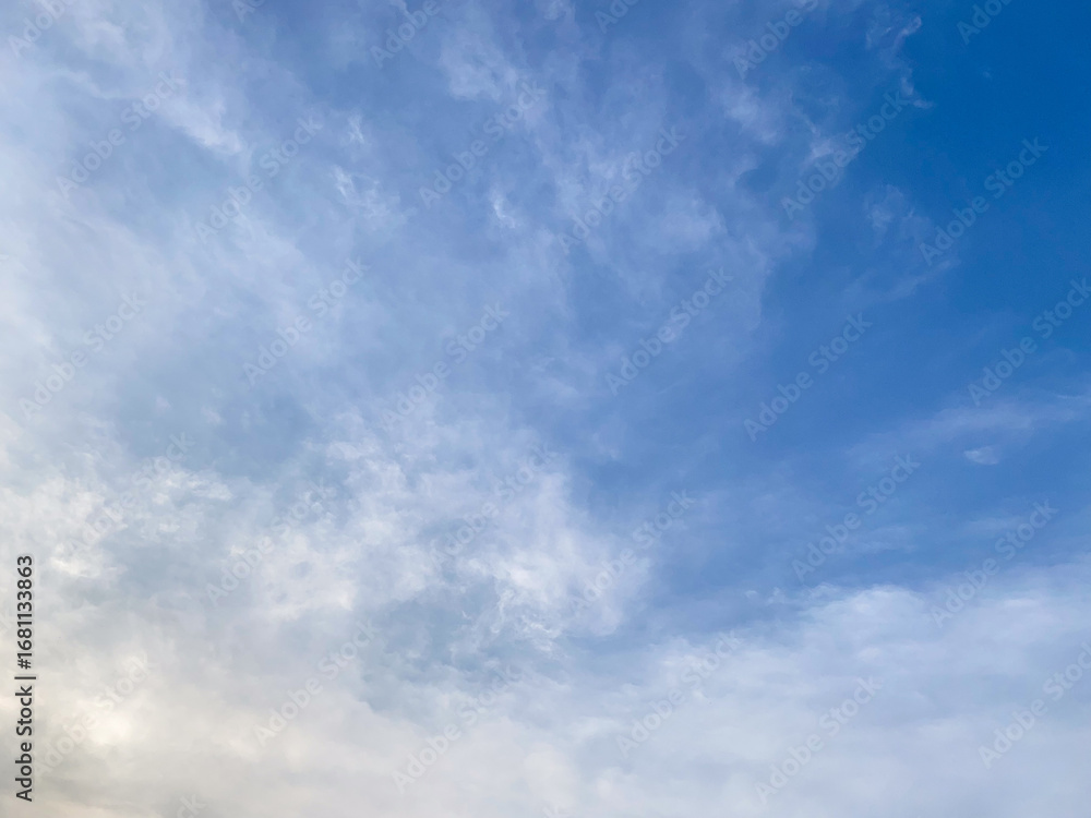 Fototapeta premium Sky View A Captivating Display of Azure Blue and Soft White Clouds in a Serene Atmosphere