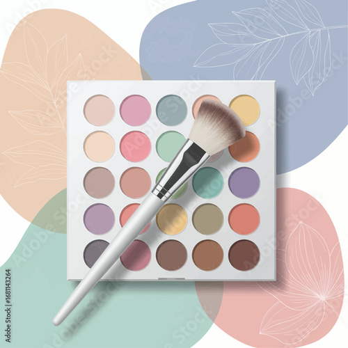 Creative makeup brush resting on a colorful eyeshadow palette with a light watercolor background