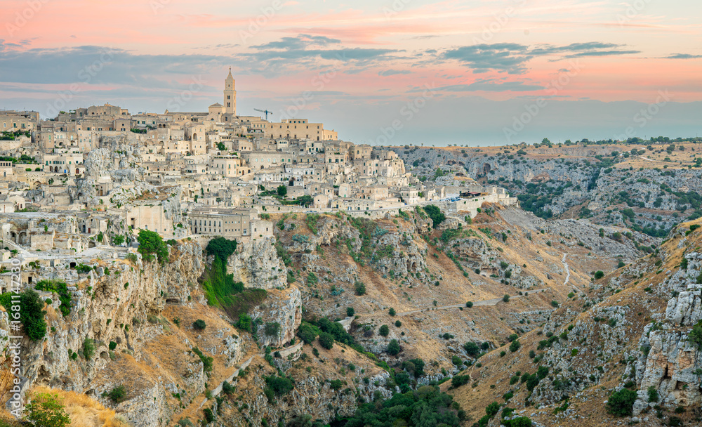 Fototapeta premium Sunrise over Matera’s Stone Cityscape 