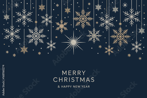 Luxurious winter holiday background featuring ornate gold and silver snowflakes in a festive hanging decoration design