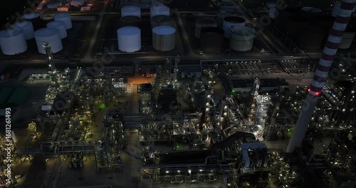 Wallpaper Mural Aerial view of an oil processing facility at dusk, showcasing its design and operations Torontodigital.ca