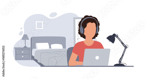 Person with headphones working on laptop in a comfortable home environment. Ideal for remote work, online learning, or virtual communication concepts.