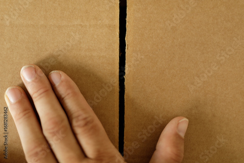 Close-up of hands gently op...