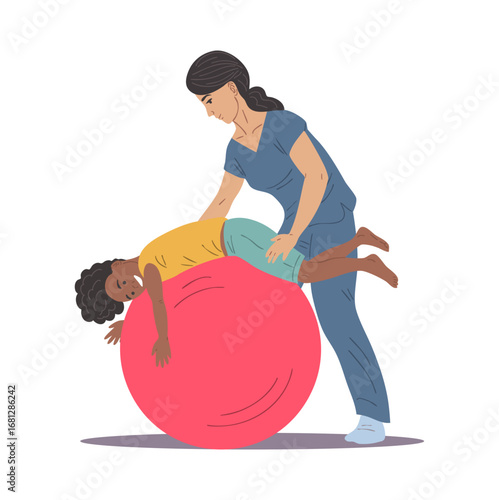 Physiotherapist helps African American boy exercise on gym ball
