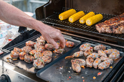 Summer Barbecue with Grilled Meat and Corn in Piedmont