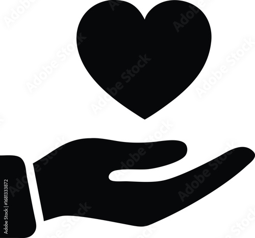 Symbolic image of a hand offering a black heart representing love care and compassion