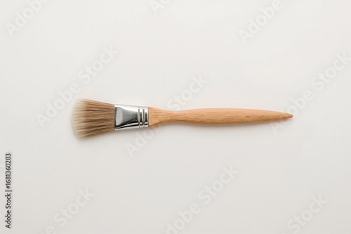 Artistic paintbrush placed ...