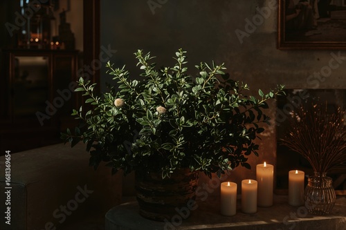 Illuminated candles casting...