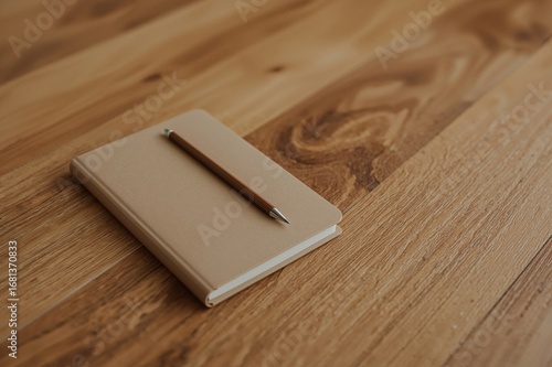 Notebook and pencil placed ...