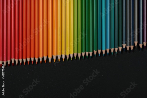 Colored Pencils Against a D...