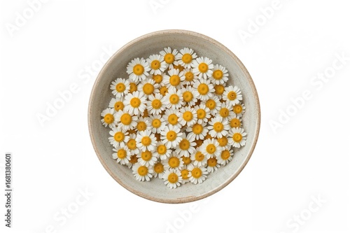 Ceramic bowl filled with ye...