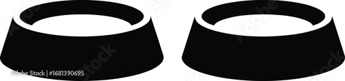 Two empty black pet food bowls side by side on a white background