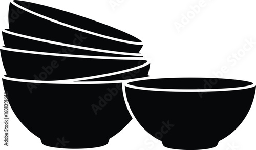 Stack of black ceramic bowls and one single bowl isolated on white background