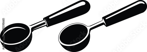 Two black coffee scoops with dark handles on a white background