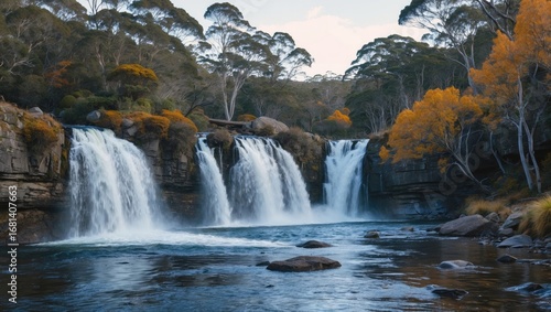 Scenic waterfall adjacent to a mountain retreat
