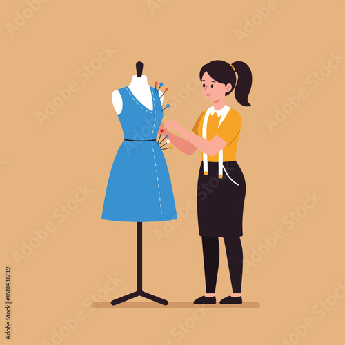 Seamstress pinning dress on mannequin in workshop