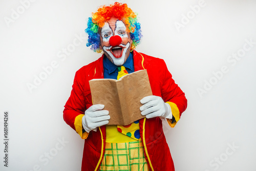 A Clown reading a book