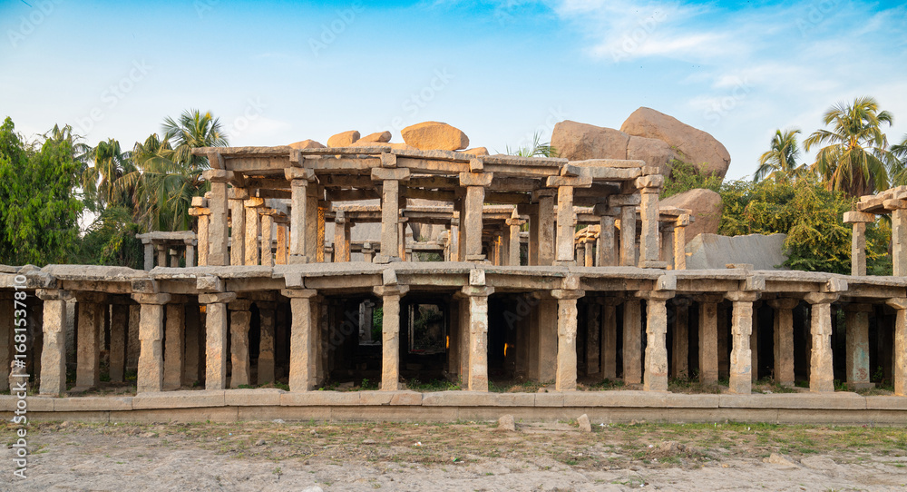 Fototapeta premium Ruin of Hampi, South India, ancient Vijayanagara Empire, hindu culture and religion at Tungabhadra river