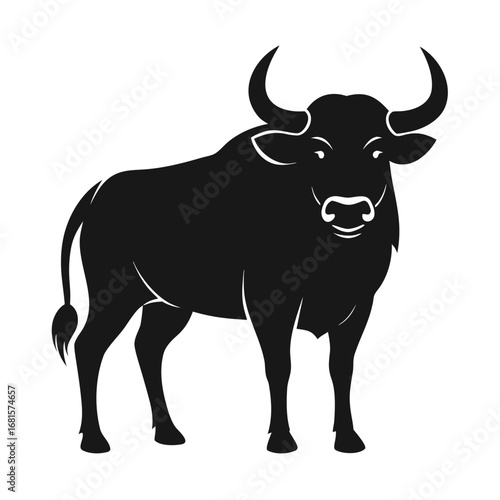 Powerful black silhouette of a standing bull