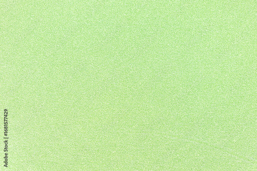 Fototapeta premium Green glitter abstract background texture. Perfect for festive Christmas and party designs