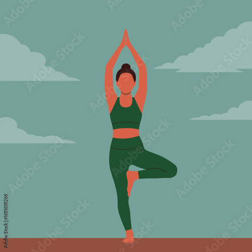 Woman in Tree Pose (Vrksasana) with Arms Raised Up to the Sky.