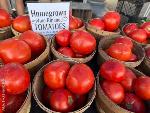 Fresh Produce Displayed at Holland Michigan's Bustling Farmers Market Where Local Growers Showcase Their Harvest
