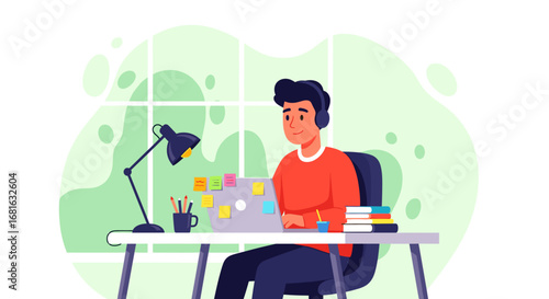 A cheerful young man wearing headphones works diligently on a laptop from his home office, ideal for concepts of remote work, online education, and modern productivity.