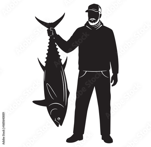 Silhouette of a fisherman proudly holding a large tuna fish after a successful fishing trip