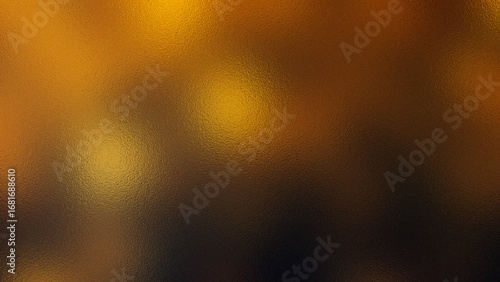 Abstract textured background with warm golden and dark brown tones and soft bokeh effect