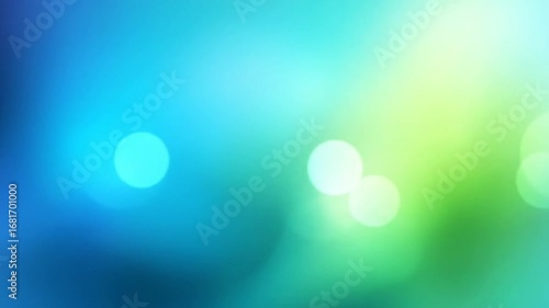 A soft-focus backdrop featuring a seamless blend of vibrant teal and spring green hues.