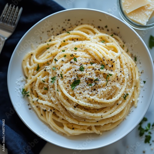 Delicious Spaghetti With Parmesan and Black Pepper Served in a White Bowl on ...