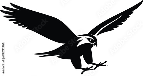 Black silhouette of a falcon in flight with wings spread wide talons extended