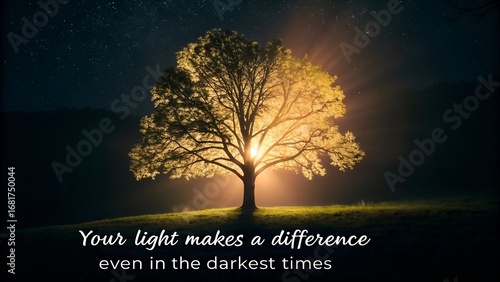 Inspirational Quote on Glowing Tree in Darkness.
