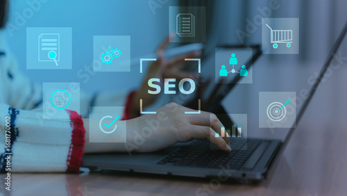 Hands typing on laptop with floating SEO icons, symbolizing search engine optimization, online marketing, and web analytics strategy.