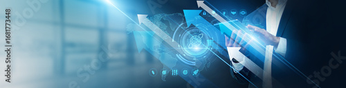 Photos International business manager using tablet analyzing market expansion and revenue growth