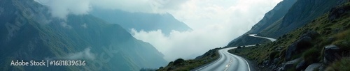 Majestic mountain pass shrouded in mist, winding road disappearing into the distance, dramatic lighting Perfect for travel, adventure, and nature themes , rural, travel