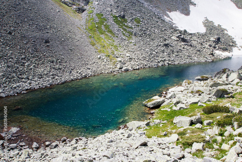 rocky coast of the mountain lake