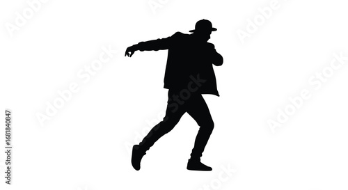 Man in a hat dancing energetically in a dynamic pose