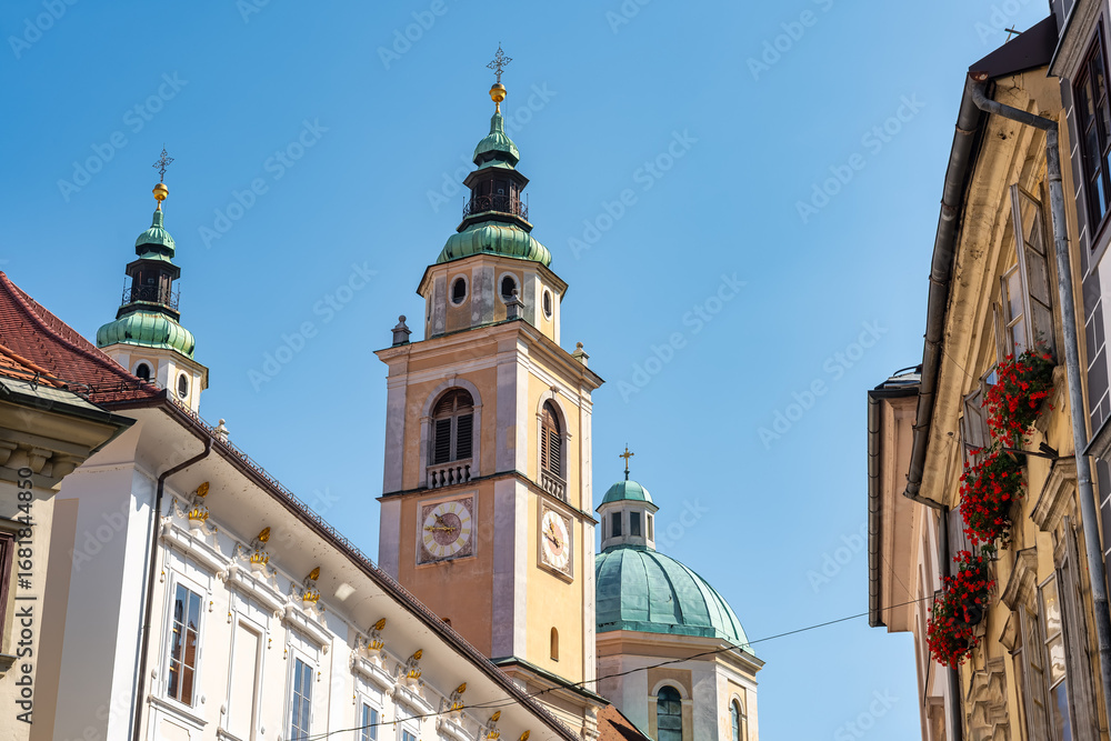 Fototapeta premium Clock tower of Ljubljana Cathedral in the capital of Slovenia.