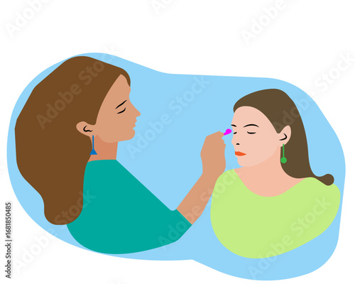 A beautician applies makeup a client for specific event 