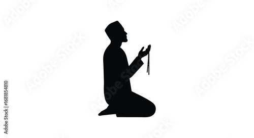 A person kneeling in prayer with a rosary in hand