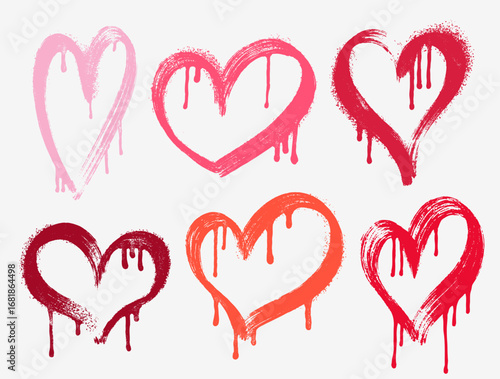 Graffiti style spray paint vector heart collection. Red, pink icons with drips, splashes and rough textures. Urban street art stickers for edgy romantic design and underground Valentine’s themes.